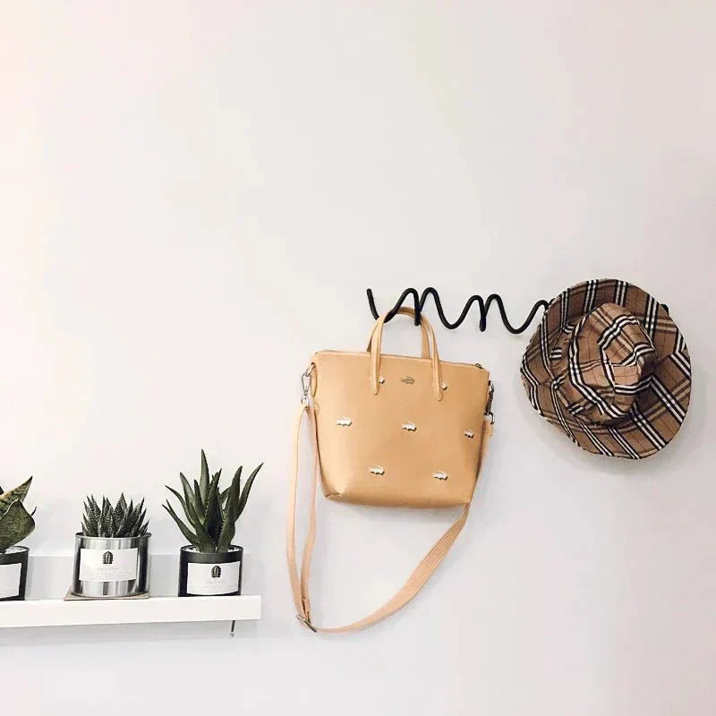 geometric-metal-wall-hook-with-matte-minimalist-finish-img3.webp
