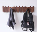 handcrafted-piano-shaped-wooden-wall-coat-rack-with-foldable-hooks-img1.jpg