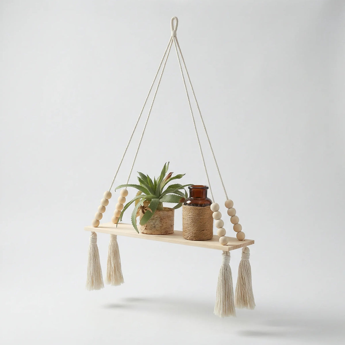 handmade-boho-hanging-wall-shelf-with-braided-cord-and-beads-img4.webp