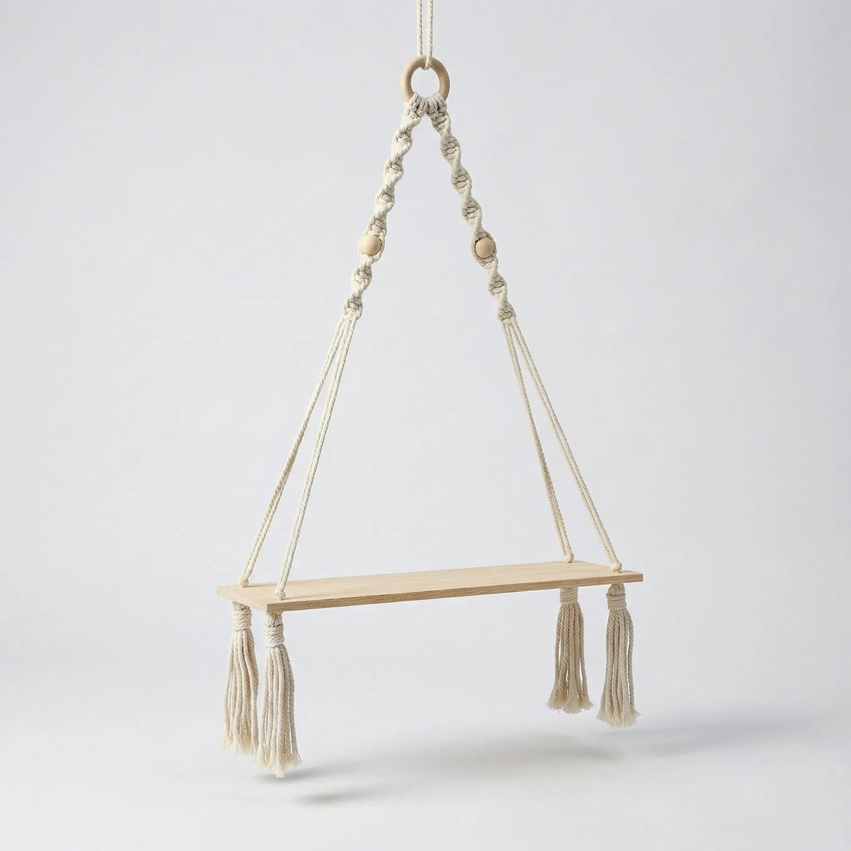 handmade-boho-hanging-wall-shelf-with-braided-cord-and-beads-img7.webp